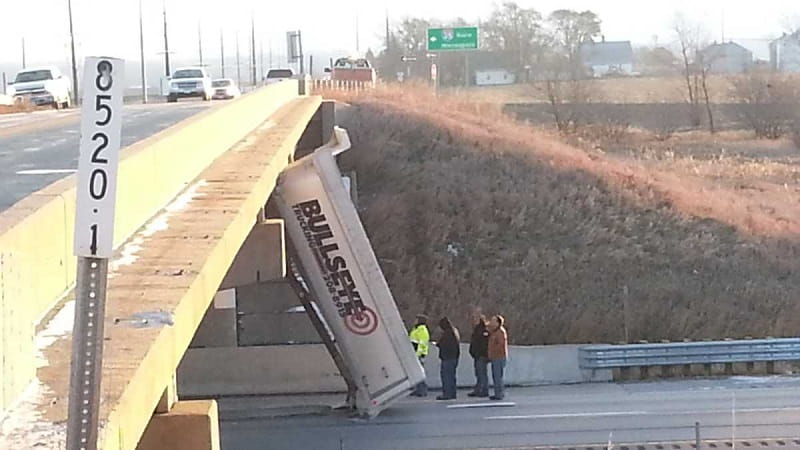 Dump Truck Hits Bridge